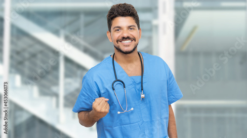 Motivated hispanic male nurse with beard