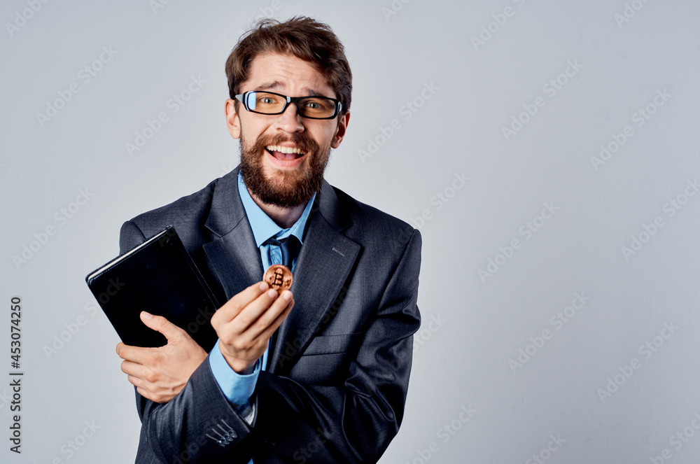 man financier in a suit cryptocurrency bitcoin economy electronic money man financier in a suit cryptocurrency bitcoin economy electronic money