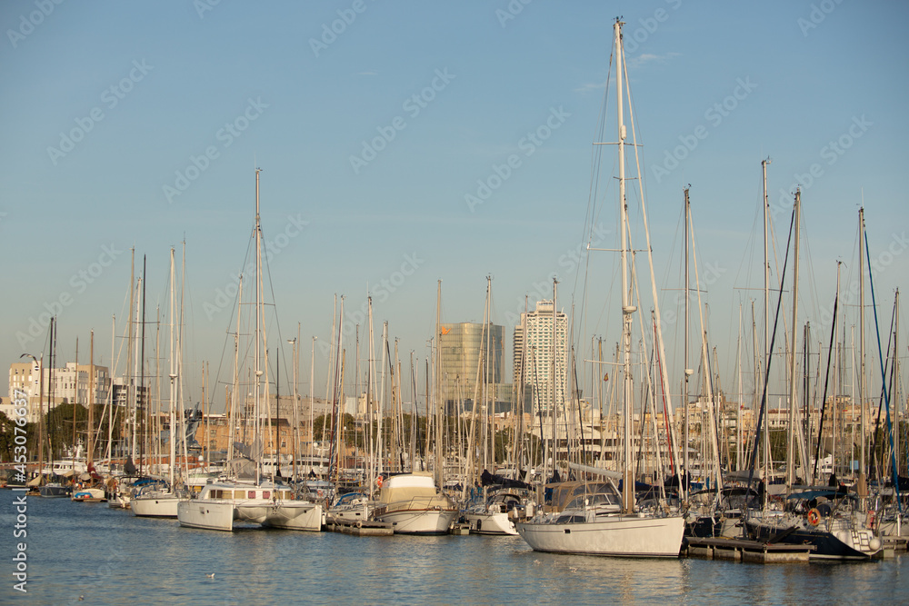 Yachts and catamarans moored in Port Vell, Barcelona Yachts and catamarans moored in Port Vell, Barcelona