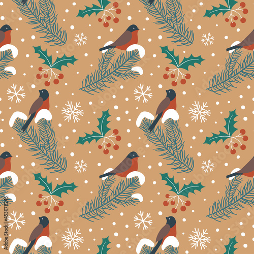 Seamless pattern with bullfinches and fir branches on craft paper. Christmas pattern of wrapping paper.