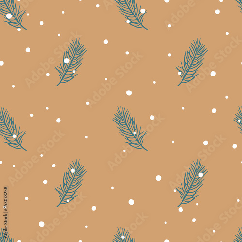 Christmas pattern on craft paper. Christmas tree twigs and snow.