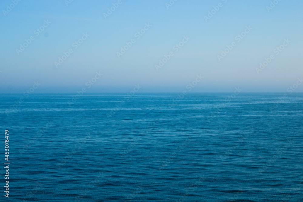 Calm Irish sea in the morning with mist in the background, seascape Calm Irish sea in the morning with mist in the background, seascape