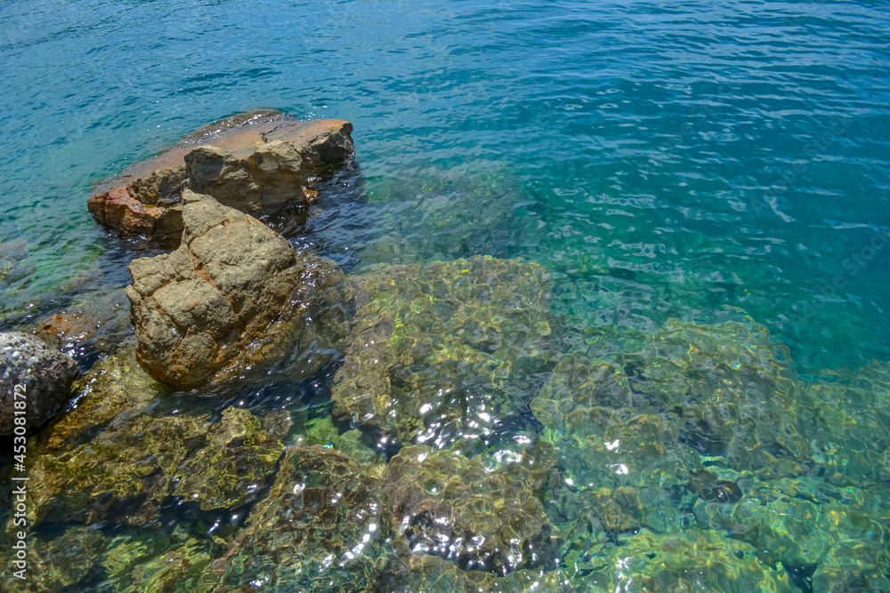 blue sea with big stones