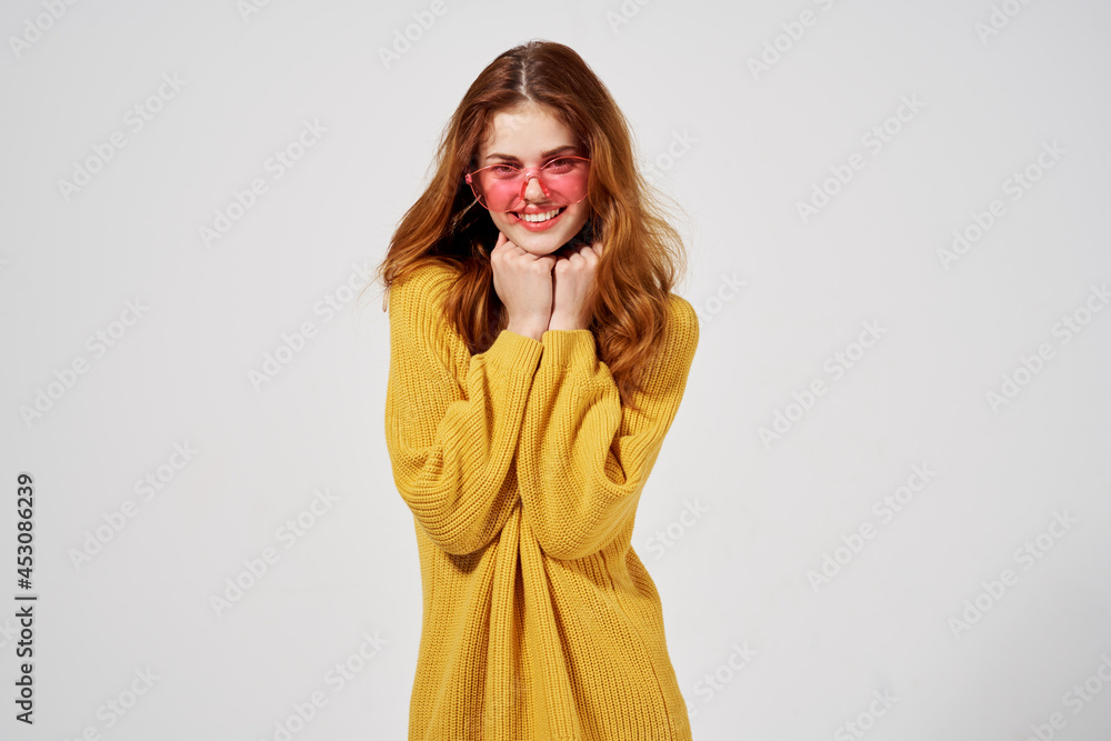 portrait of a woman in a sweater and glasses hairstyle fashion glasses portrait of a woman in a sweater and glasses hairstyle fashion glasses