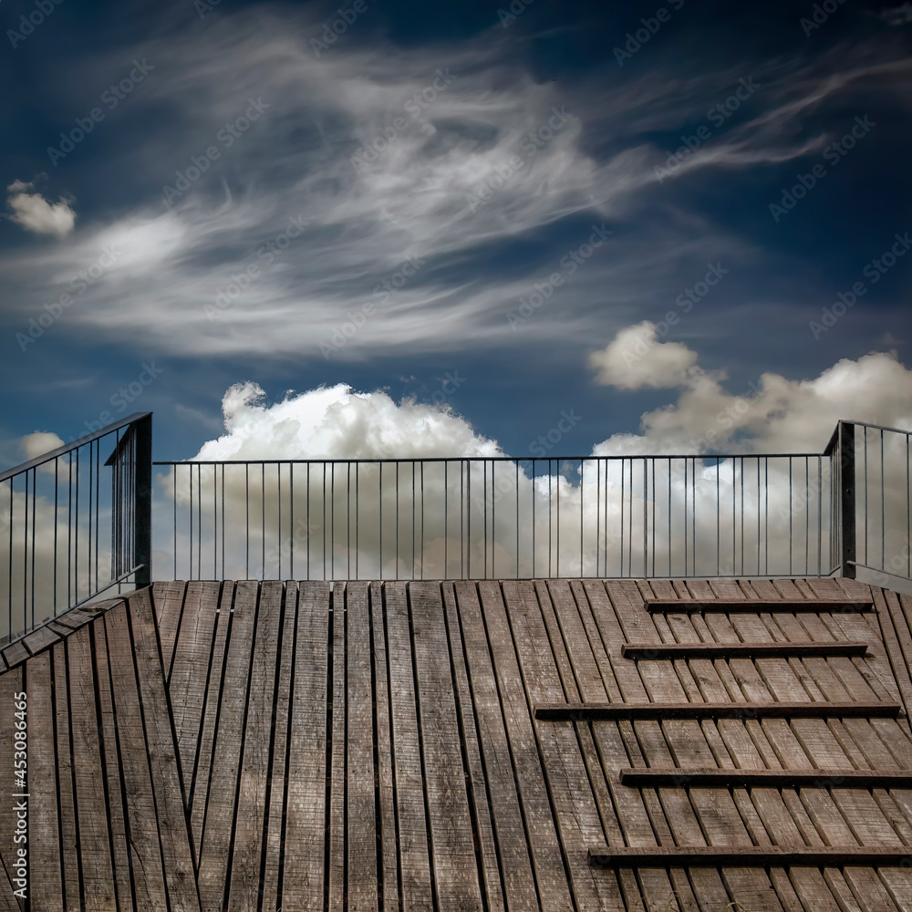 Wooden structure fragment under blue - cloudy sky. Wooden structure fragment under blue - cloudy sky.