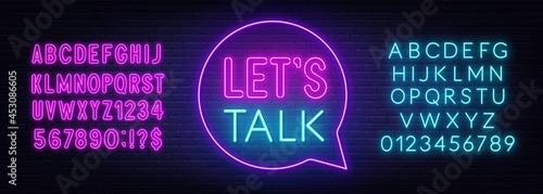 Neon sign Let s Talk in the speech bubble on brick wall background.