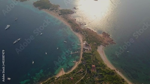 Aerial Top Forward Scenic View Of Sardinia Island During Sunset, Drone Flying Over Nautical Vessels In Sea - Corsica, France