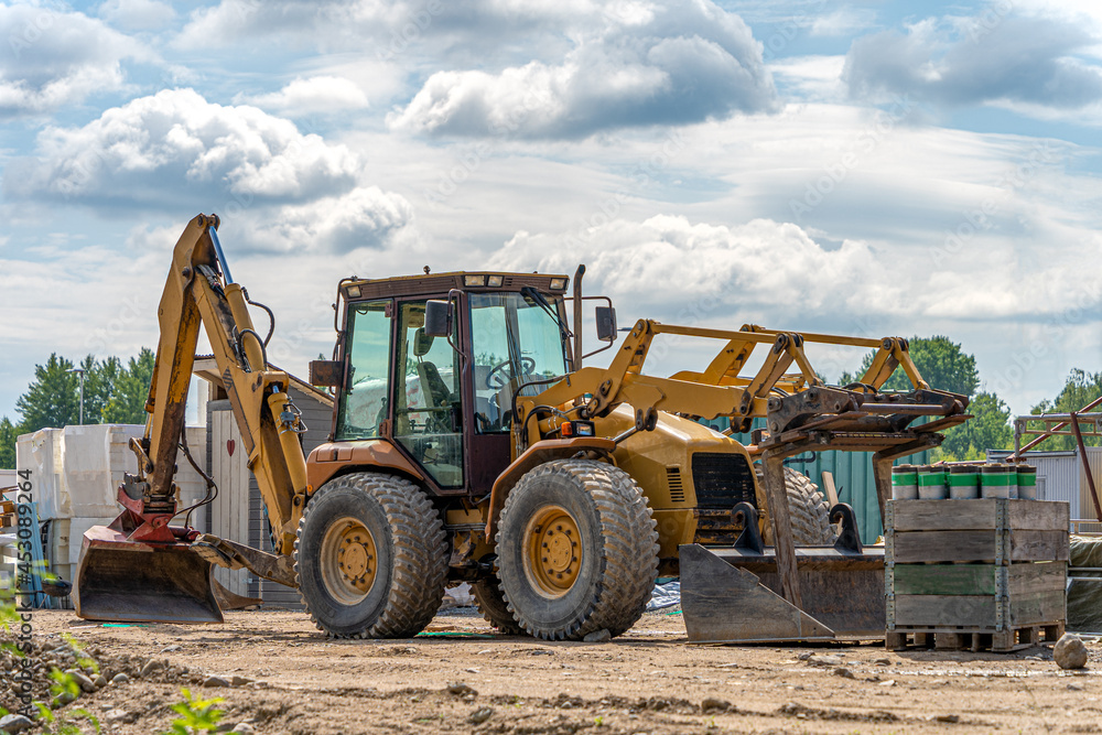 Image of building machines on the house construction site Image of building machines on the house construction site