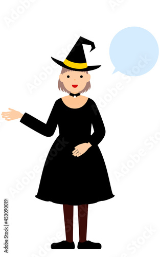 ハロウィンの仮装、魔女姿の女の子が右手を出して話しているポーズ（吹き出しつき）