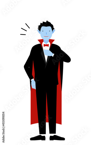 ハロウィンの仮装、バンパイア姿の男性が胸を叩いているお任せあれのポーズ