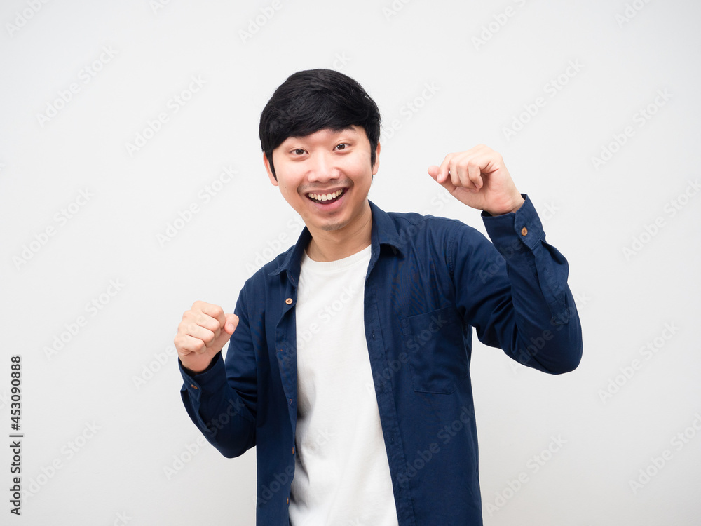 Portrait asian man dancing funny emotion happy at face white background Portrait asian man dancing funny emotion happy at face white background