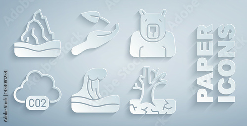 Set Tsunami, Polar bear head, CO2 emissions in cloud, Withered tree, Sprout hand and Iceberg icon. Vector