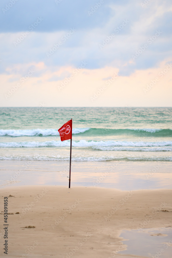 Flag - No Swim. In front of beautiful ocean wave. Phuket. Flag - No Swim. In front of beautiful ocean wave. Phuket.