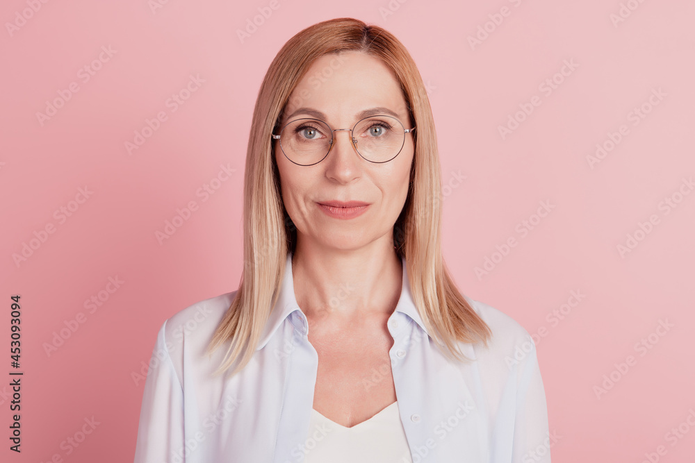 Photo of young attractive confident business woman happy positive smile isolated over pink color background
