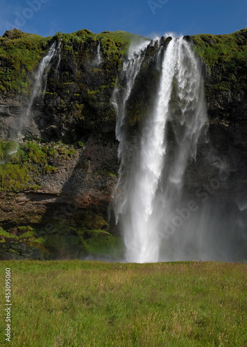 Seljalandsfoss waterfall on the southern coast of Iceland on a sunny day