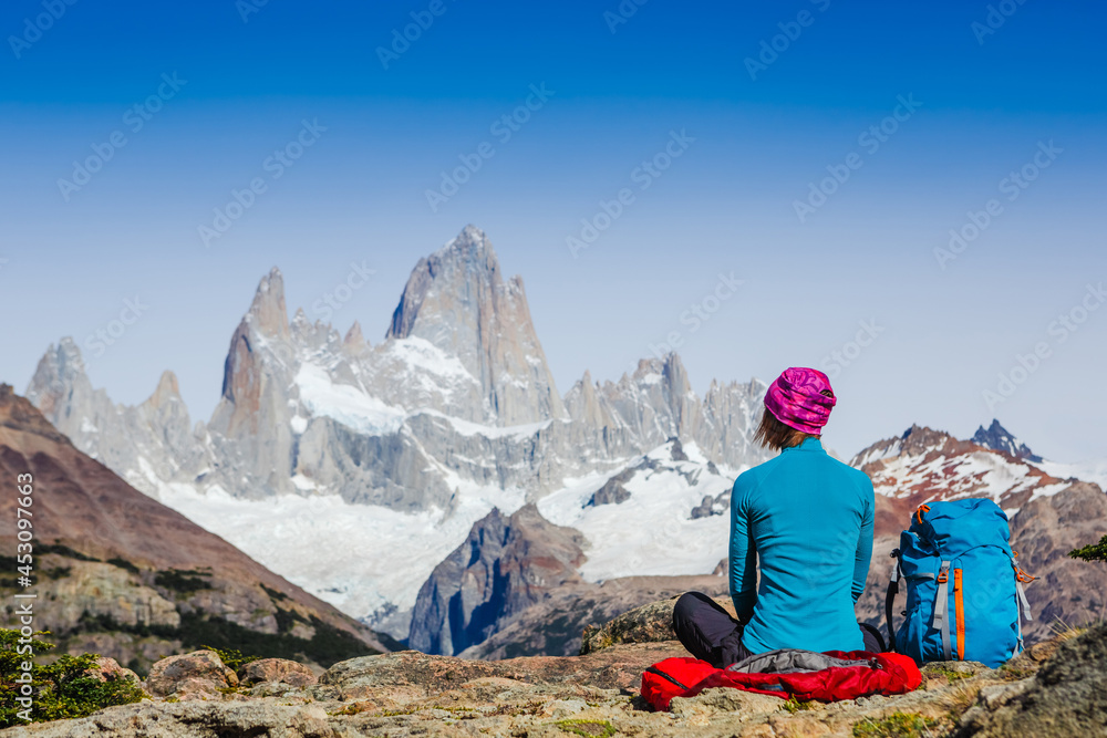Advanture traveler enjoy the view of Fitz Roy Mountain, Patagonia. Mountaineering sport lifestyle concept Advanture traveler enjoy the view of Fitz Roy Mountain, Patagonia. Mountaineering sport lifestyle concept