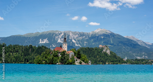 Bled lake, Church on the Island and Castle behind, Slovenian Alps photo