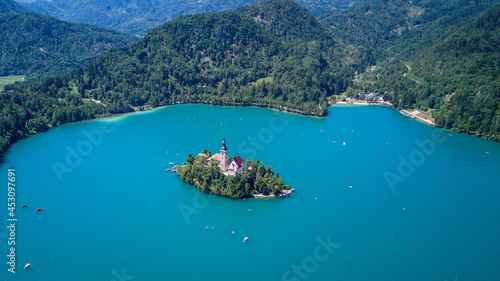 Church on lake blake island in slovenia photo