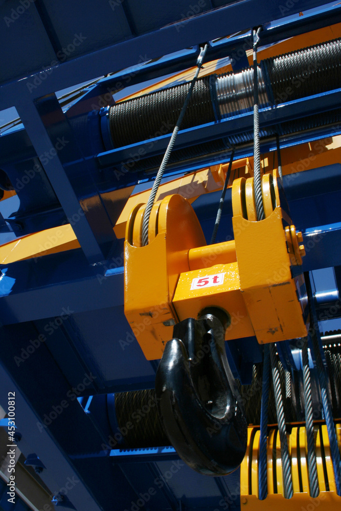Powerful crane hook. Industrial background Powerful crane hook. Industrial background