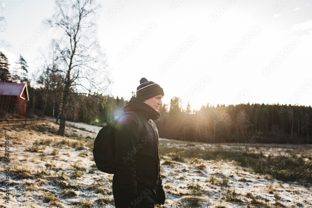 Side view of man walking at winter Side view of man walking at winter