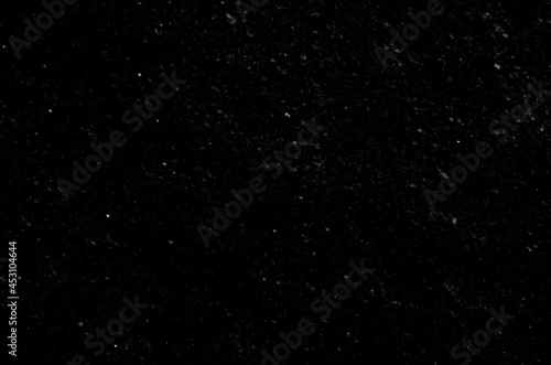 small snowflakes on a black background