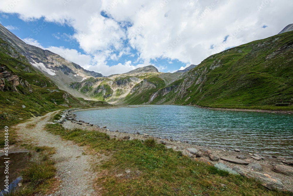 Nassfeld Speicher lake next to Grossglockner High Alpine road in Hohe