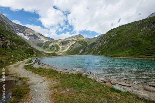 Nassfeld Speicher lake next to Grossglockner High Alpine road in Hohe
