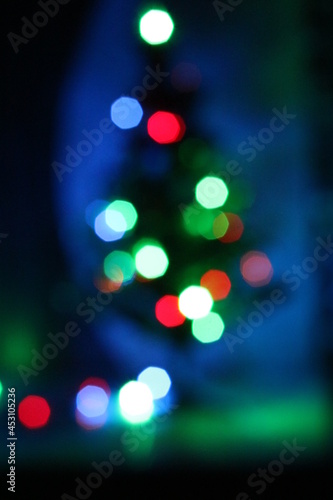 Christmas light tree decoration in dark with blur background