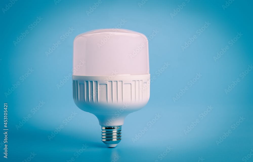 LED light bulb on blue color background. LED light bulb on blue color background.