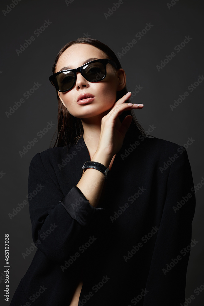fashion portrait of Beautiful sexy woman in sunglasses fashion portrait of Beautiful sexy woman in sunglasses