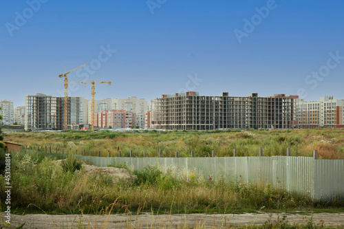 Construction site of a new residential houses © Ivanna