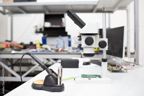 Microscope and soldering iron in Scientific research tech Laboratory