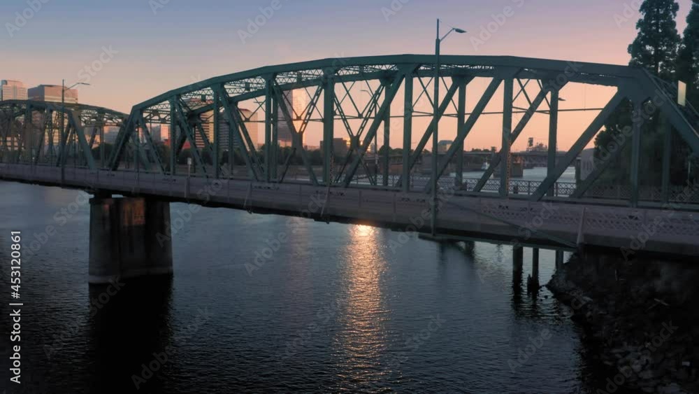 Aerial: Hawthorne Bridge over the Willamette River and downtown Portland at sunrise, Oregon, USA Aerial: Hawthorne Bridge over the Willamette River and downtown Portland at sunrise, Oregon, USA