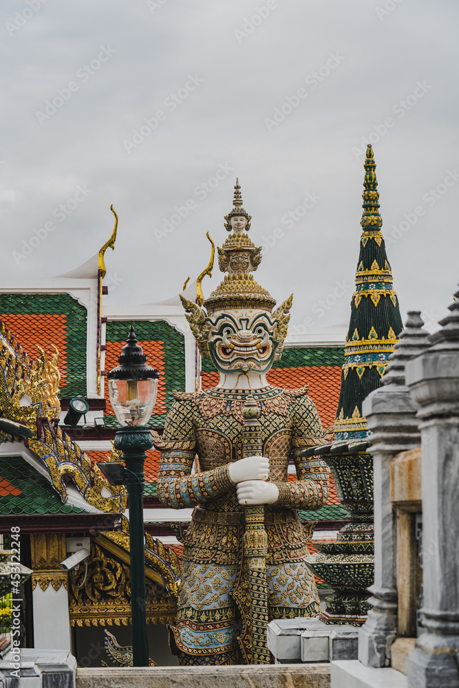 Giant statue at the grand palace  the Temple of the Emerald Buddha.
