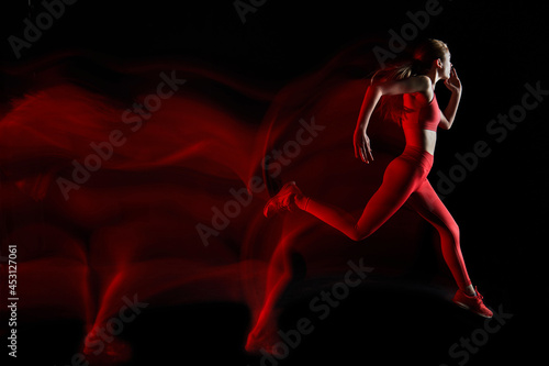 Female sprinter in motion photo