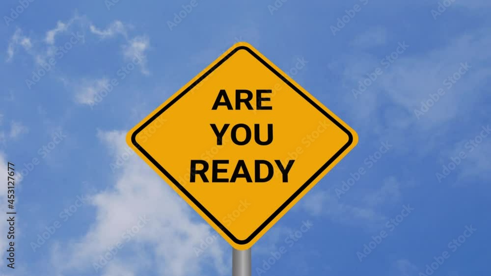 Are You Ready Road Sign on Clear Blue Sky with Rapid Moving Clouds for Text Placement Are You Ready Road Sign on Clear Blue Sky with Rapid Moving Clouds for Text Placement