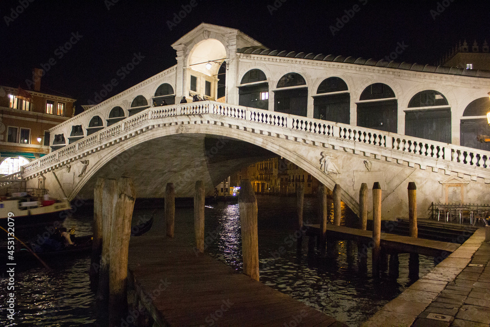 Venice, Italy, January 28, 2020 evocative image of the Rialto Bridge by night, one of the most 
famous symbols of the city