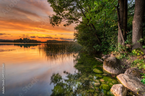 Fototapeta Naklejka Na Ścianę i Meble -  Beautiful summer sunrise over the lake
