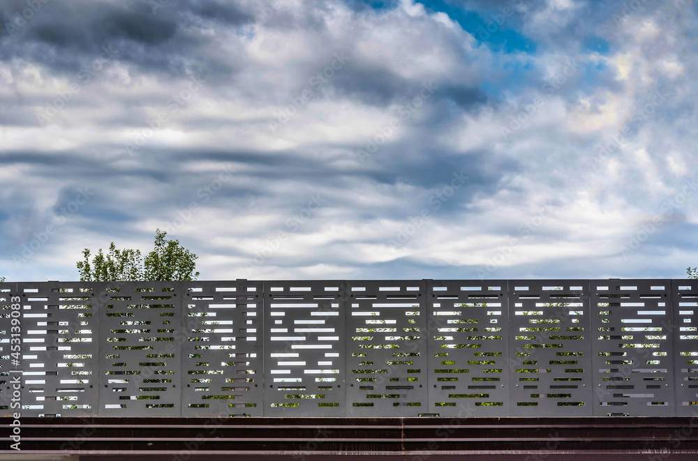 Perforated Metal Fence. Metal sheet panel fence Stock Photo Adobe Stock