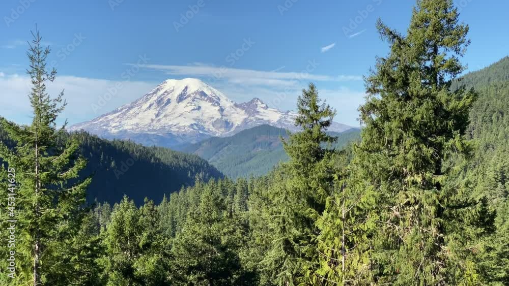 Mount Rainier with Cascade Mountain forests all around. Mount Rainier with Cascade Mountain forests all around.