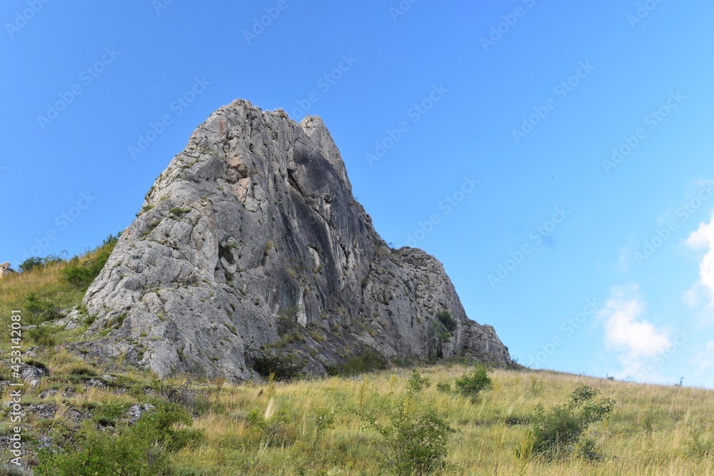 A limestone rock in the Trascau mountains, Transylvania, Romania. A limestone rock in the Trascau mountains, Transylvania, Romania.
