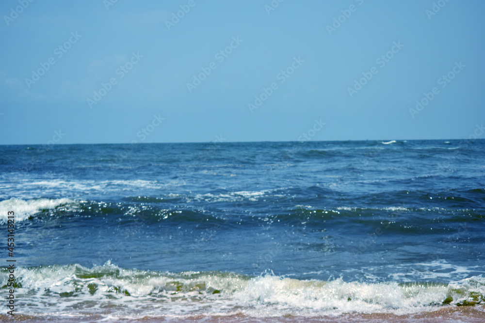 Ocean-Sea Waves AND Sky Blue Landscape Background Ocean-Sea Waves AND Sky Blue Landscape Background
