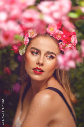 Beautiful woman with flowers wreath