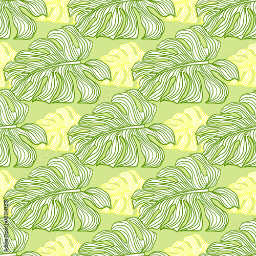 Green and yellow contoured monstera leaves seamless doodle pattern. Pastel tropical artwork.