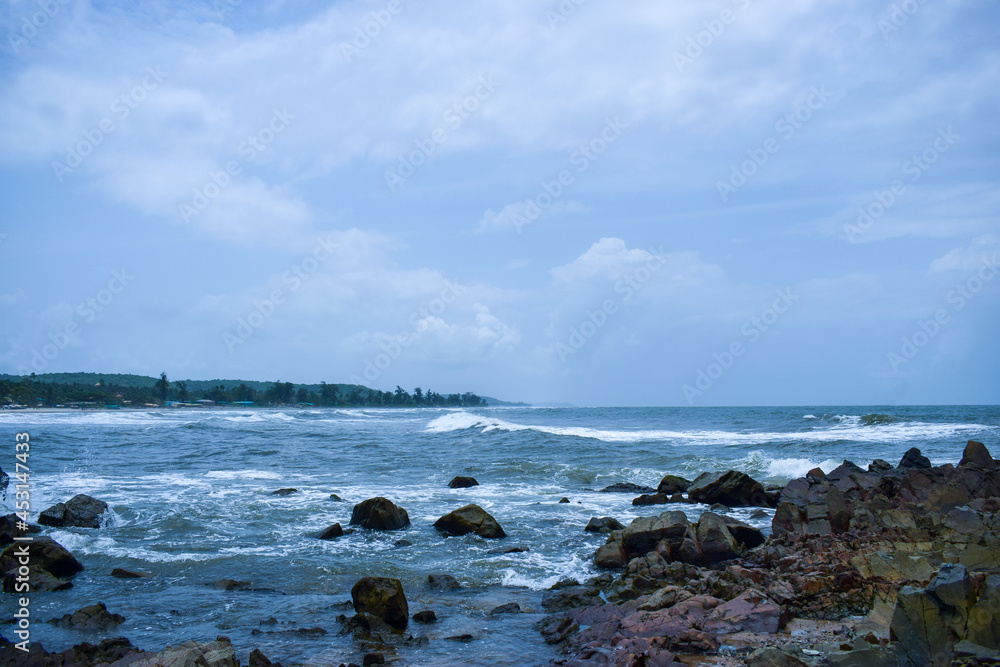 Ocean-Sea Waves, Mountains Rock Stones and Sky Blue Landscape Background