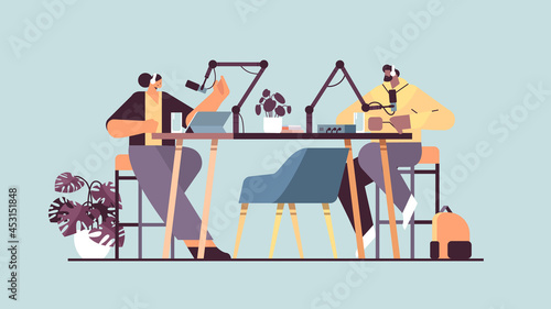 podcasters talking to microphones recording podcast in studio podcasting online radio broadcasting concept