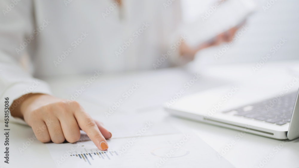 Fototapeta premium Business Professional Accountant Woman working on laptop computer making research for planning startup at desktop working process in office