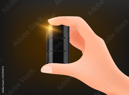 Man holding barrel of oil in a hand. Oil business concept