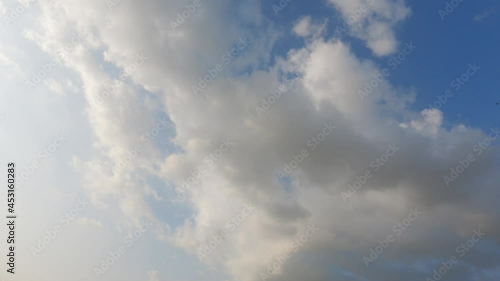 4K Time lapse of beautiful blue sky with white fluffy clouds during the monsoon 4K Time lapse of beautiful blue sky with white fluffy clouds during the monsoon
