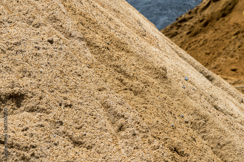 Coarse Sand pile and Find Granular Sand pile and fill Sand pile. used to make concrete  , to create  path , to create  floor. Sand texture , Sand  background and Sand isolated.